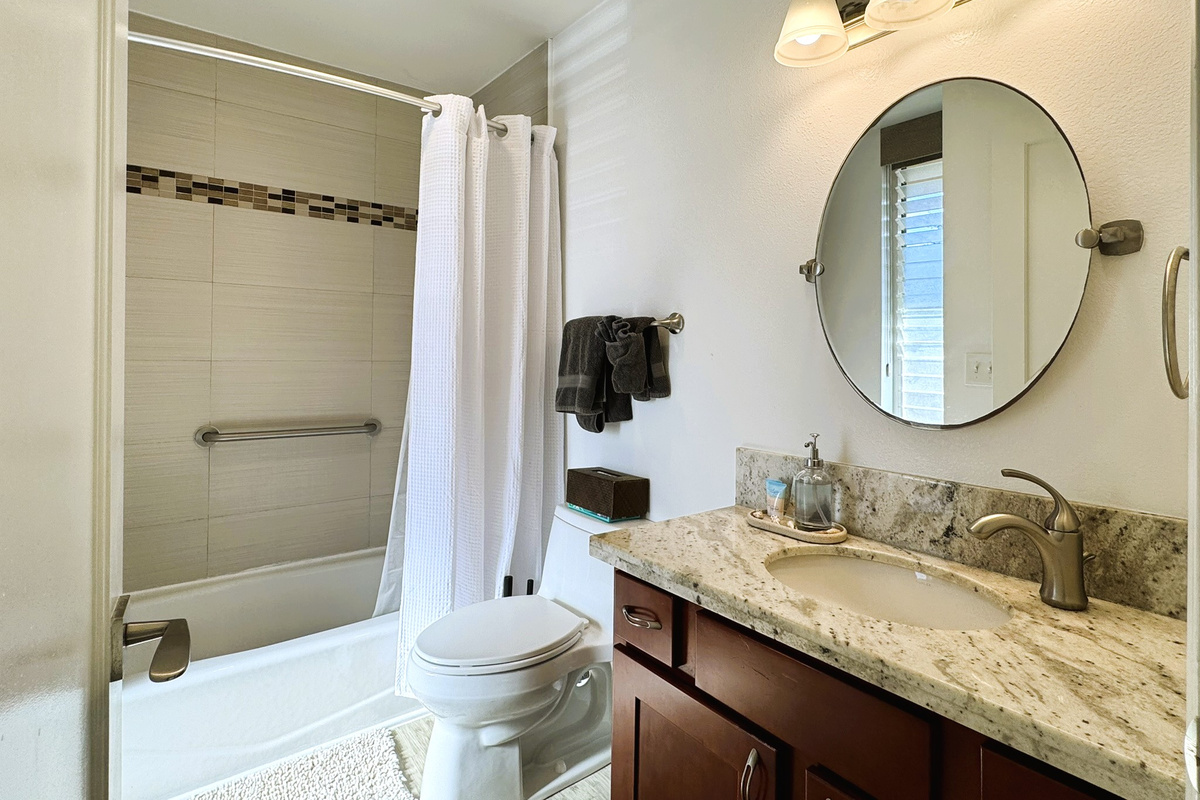 Full bathroom includes washer and dryer inside