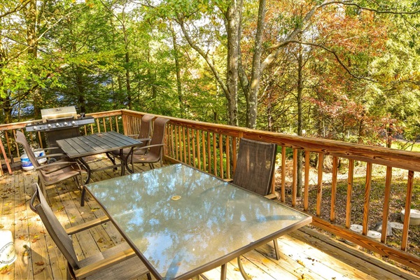 Make use of the included propane grill and tons of deck seating while playing a mean game of Rummy. You can even catch some lake views in the autumn and winter seasons when the leaves fall.