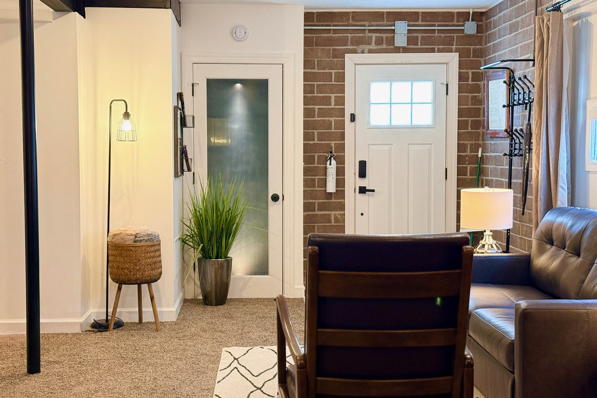 Open studio layout connects the living area with the private entrance.