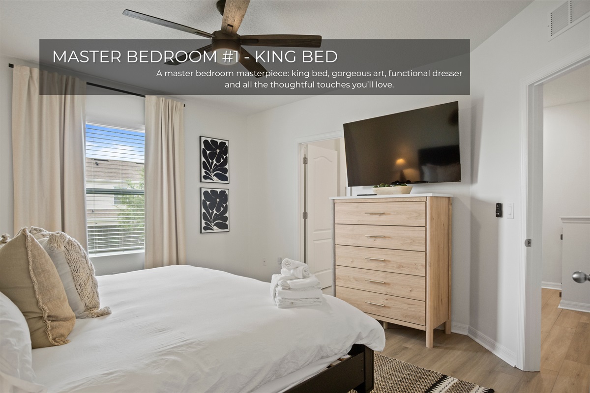 King bed and private bathroom for a restful master retreat.