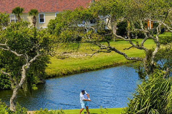 Tee time is only steps away. Picture unhurried mornings on the fairway, a friendly wager between family, and the satisfying click of a well-struck drive carrying out over the water. Golfers of every age find their happy place on this scenic course.