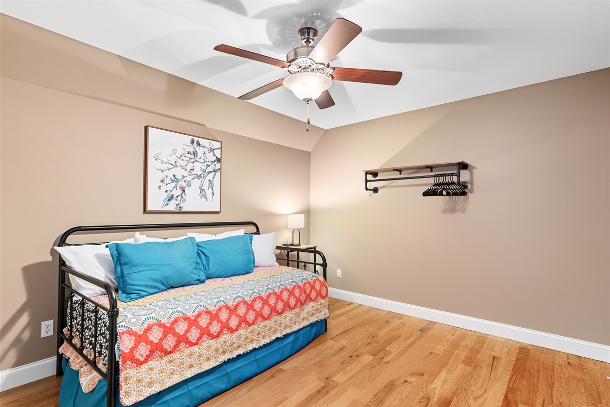 Room for the littles (or teens). A cozy twin daybed with trundle in a playful, inviting space.
