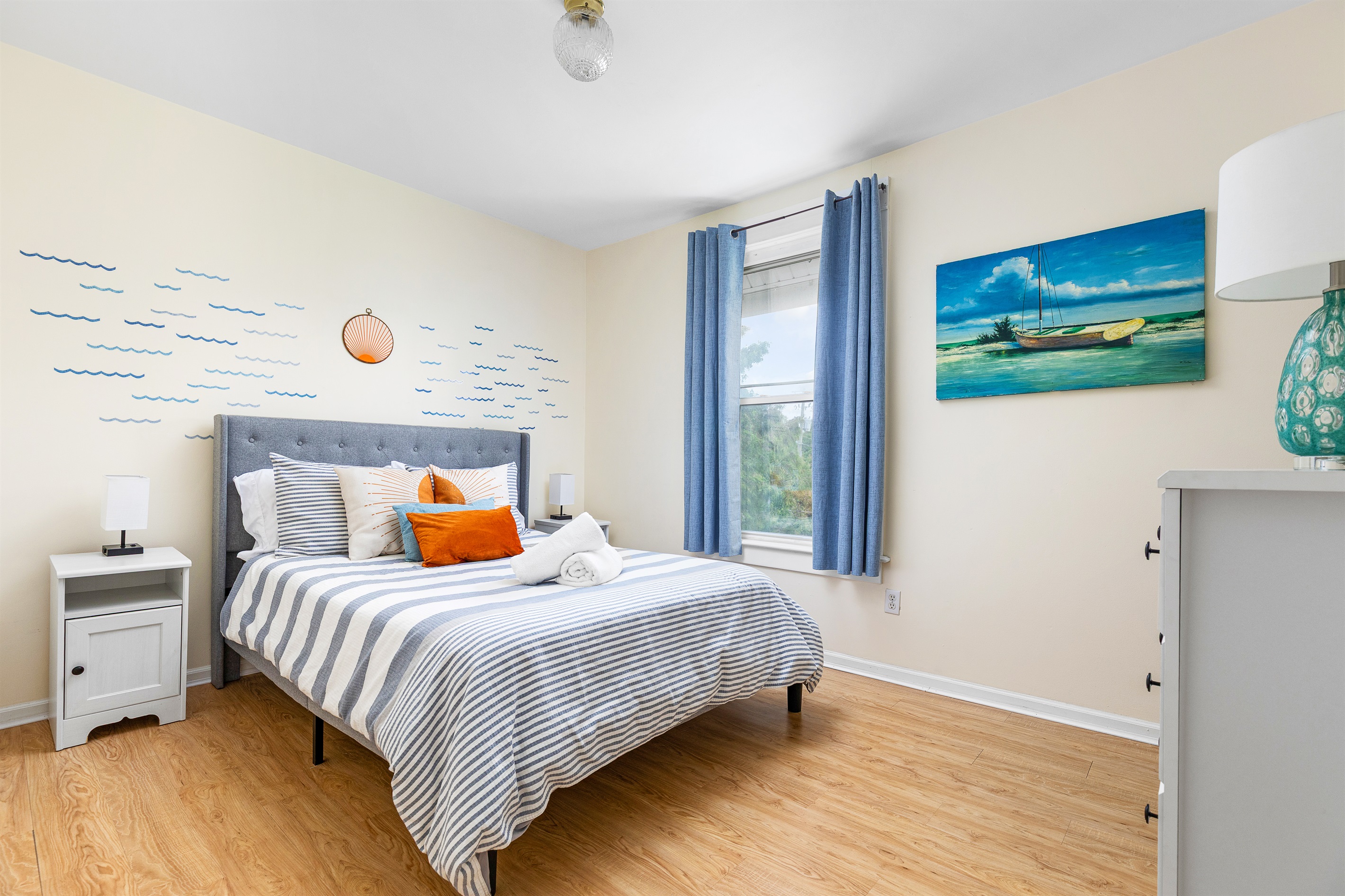 Drift off in a coastal inspired bedroom that feels light, relaxing, and wonderfully easy to settle into.