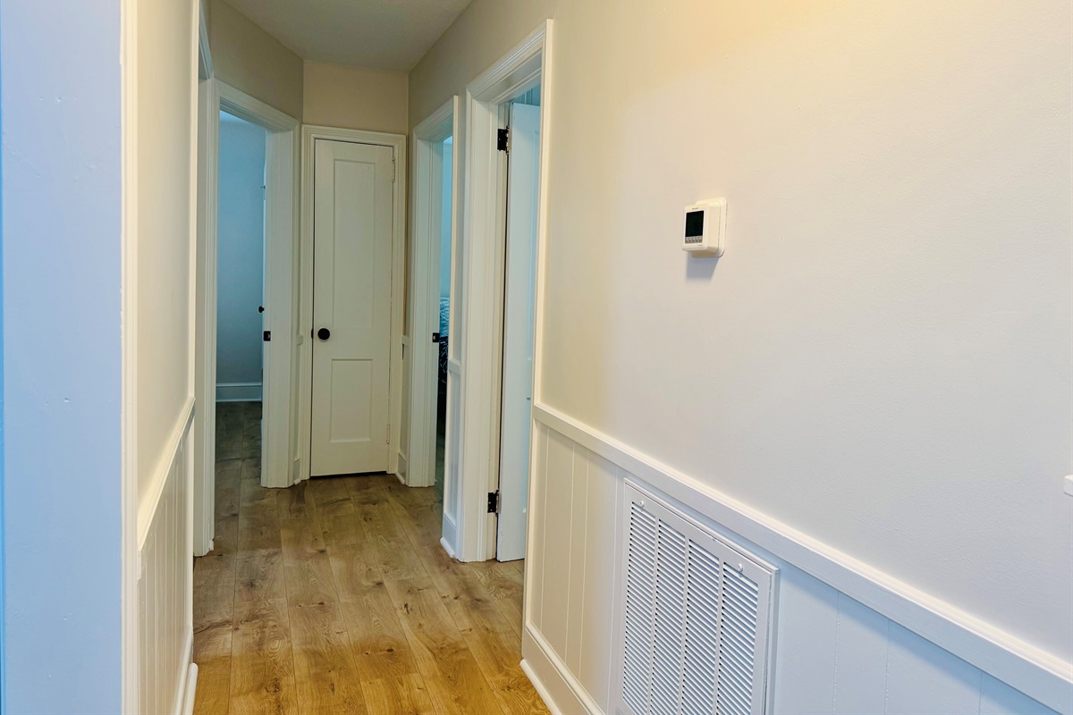 Hallway to bedrooms and bathroom.