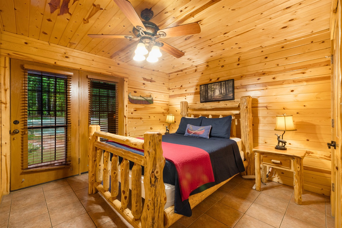 Bedroom 3 alternate view with vaulted ceilings and rustic charm.