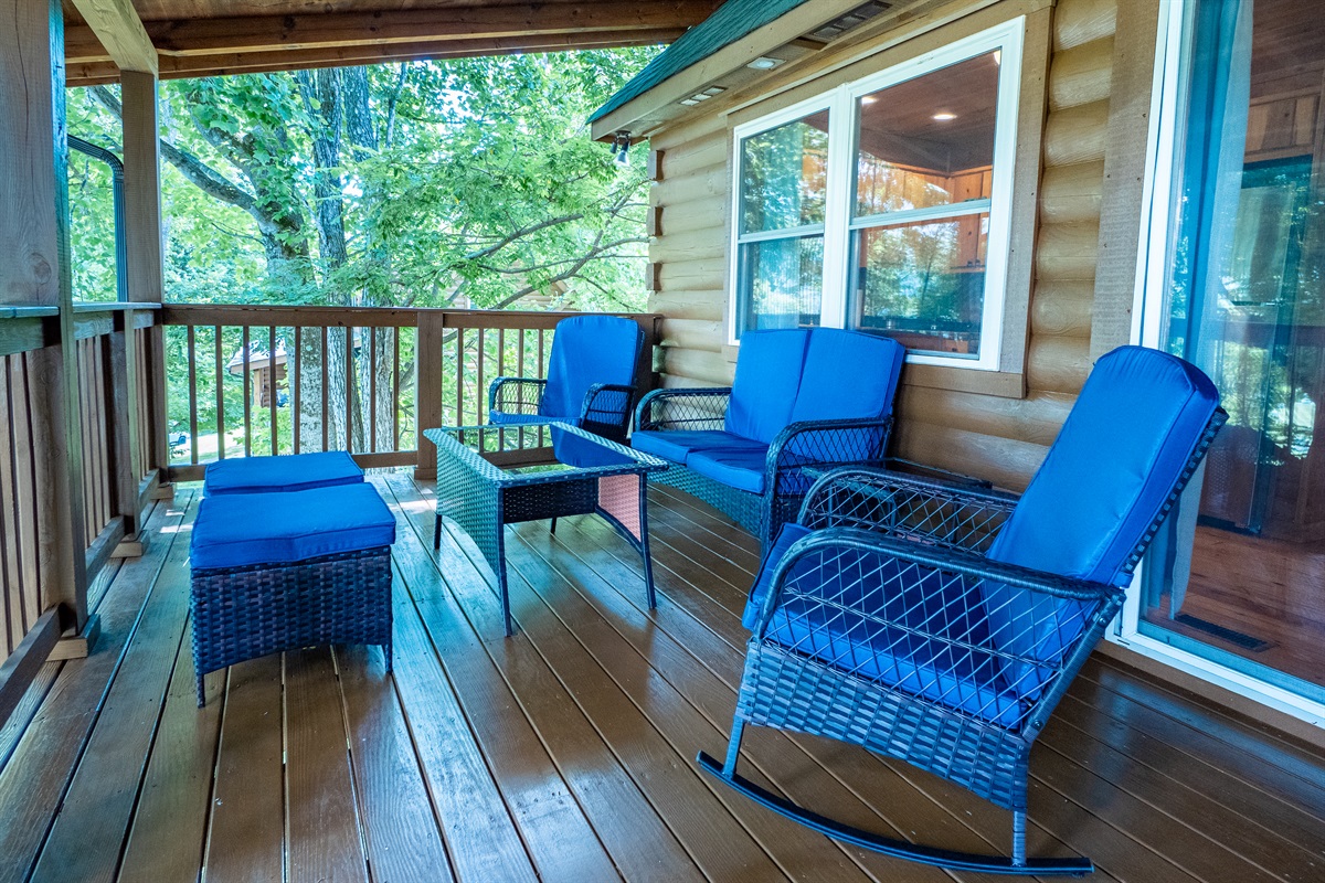 Relaxation perfected! The back deck provides ample seating for everyone to unwind and enjoy the peaceful surroundings.