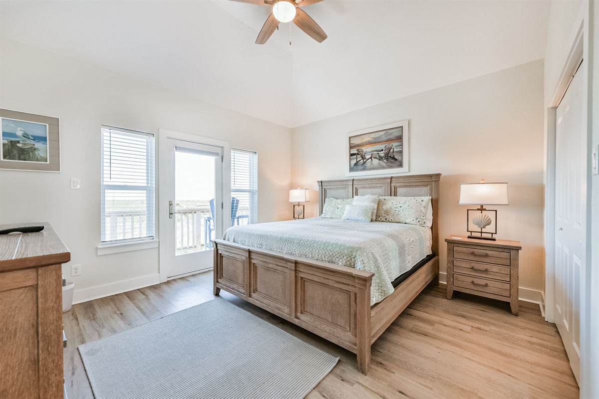 Primary Bedroom with Ensuite Bathroom & patio access.