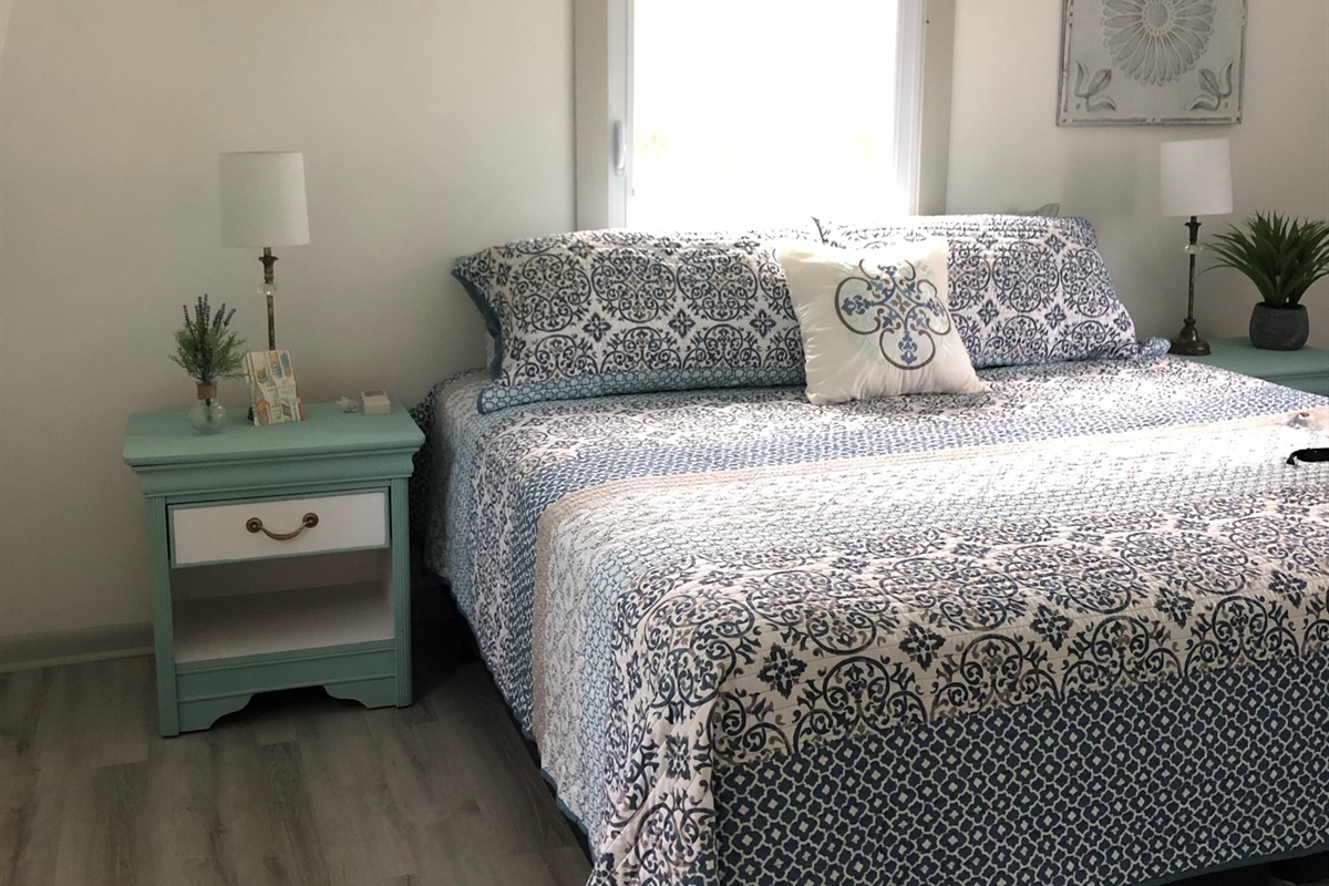 Pool House bedroom with a king bed