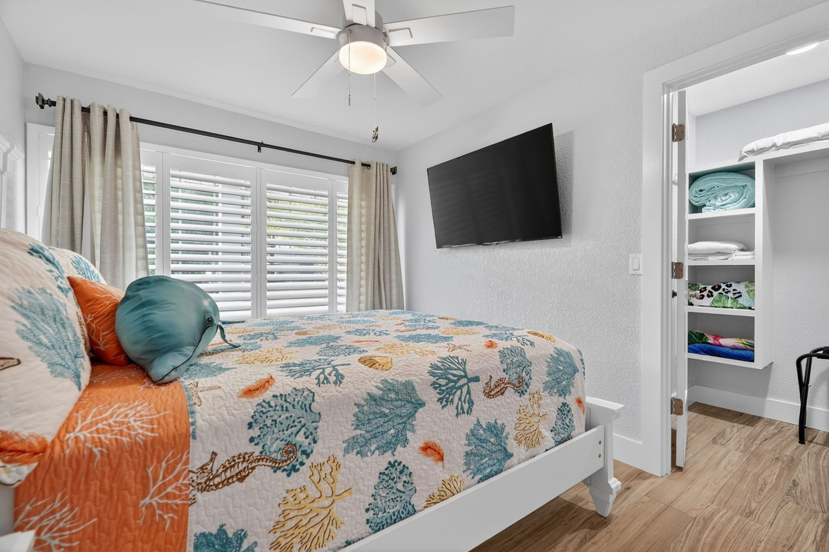 Bedroom with patterned bedspread