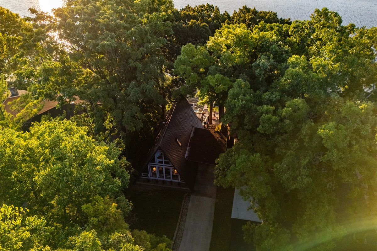 Gorgeous A-Frame design, trees galore and serious views and access to the lake. What more could you want!