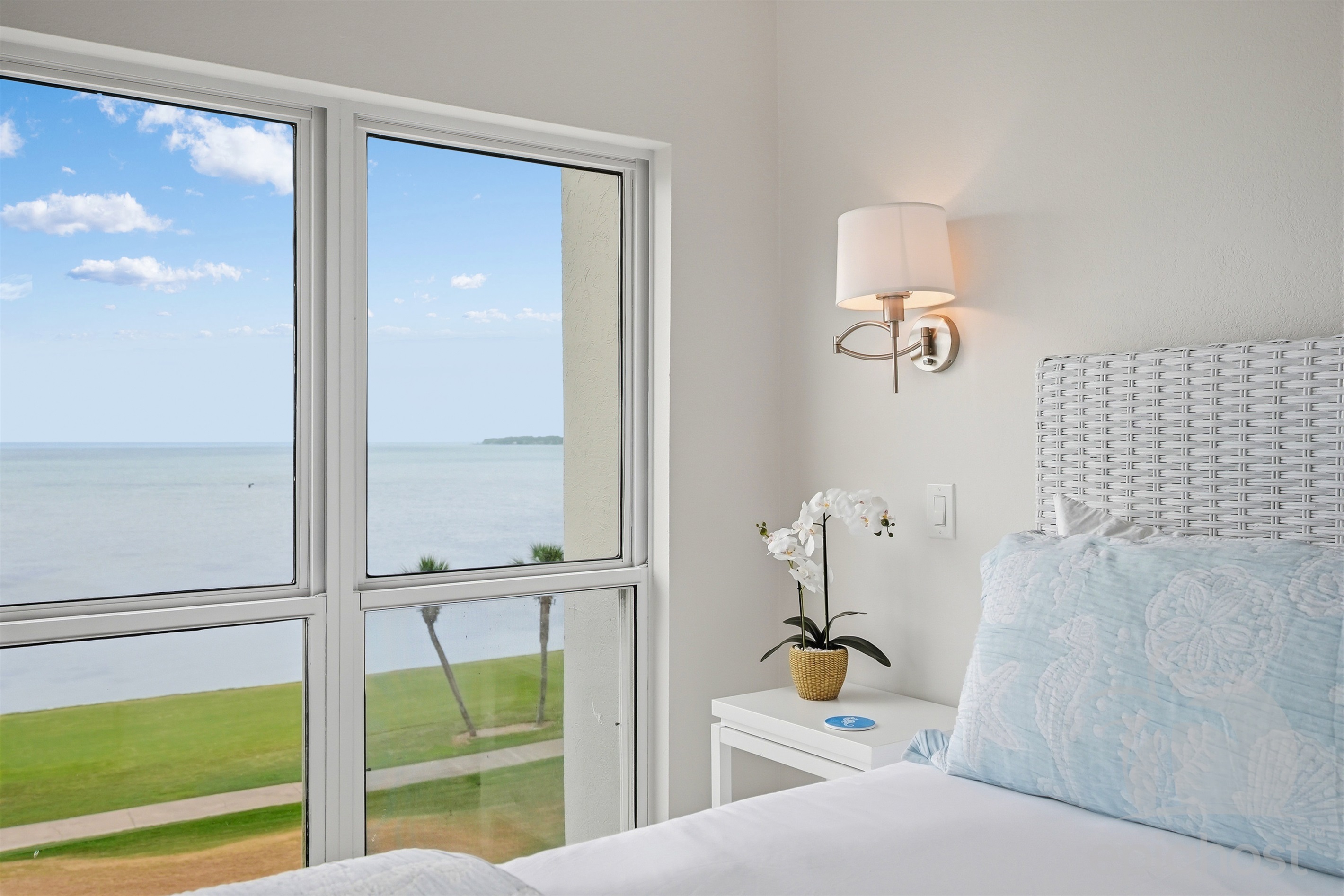 Master bedroom corner with bay-view windows