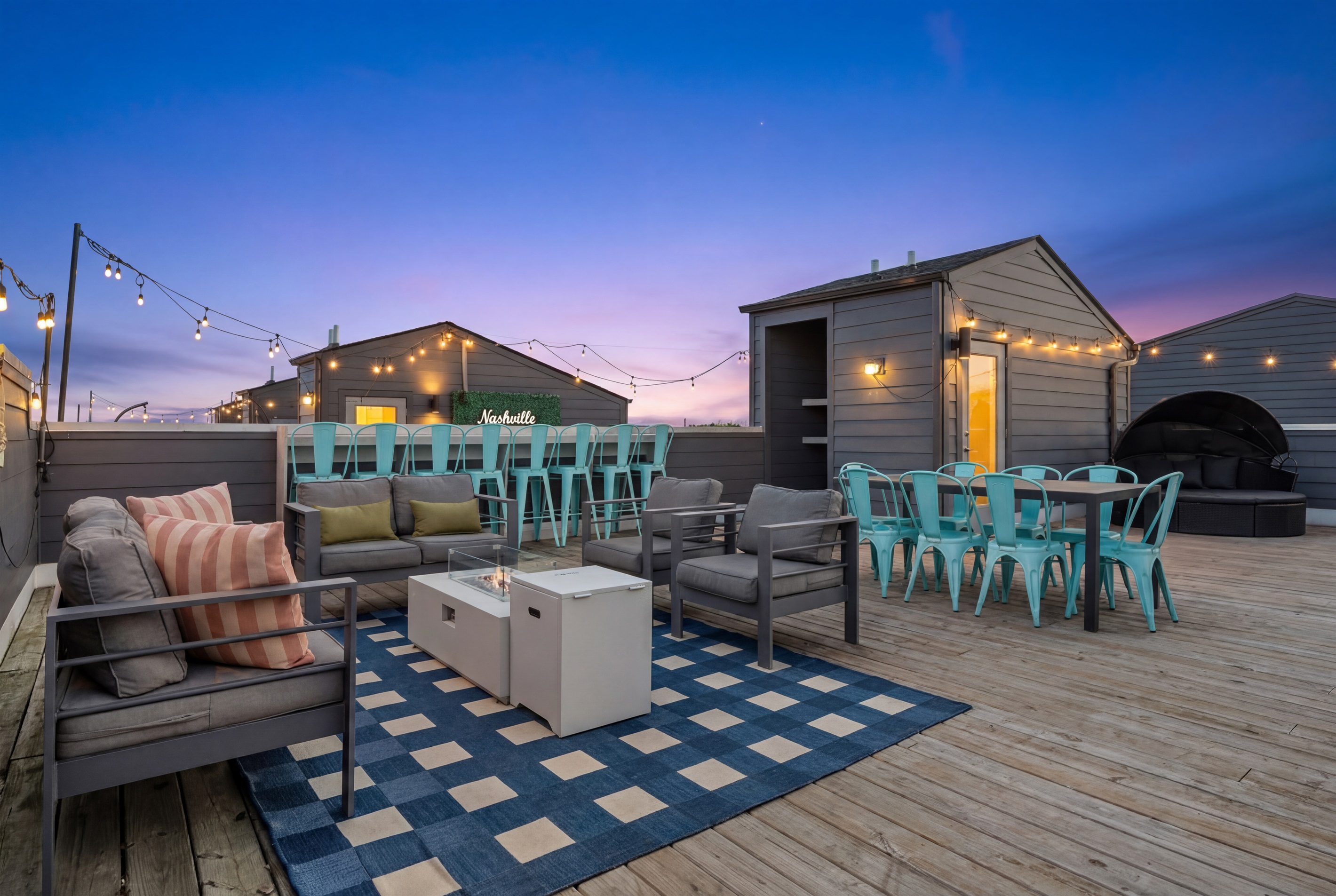 Rooftop Lounge: Unwind under twinkling lights with stunning sunset views and comfy seating!