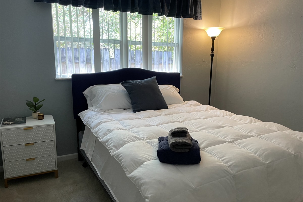 Our second bedroom is comfortable with plenty of closet space.