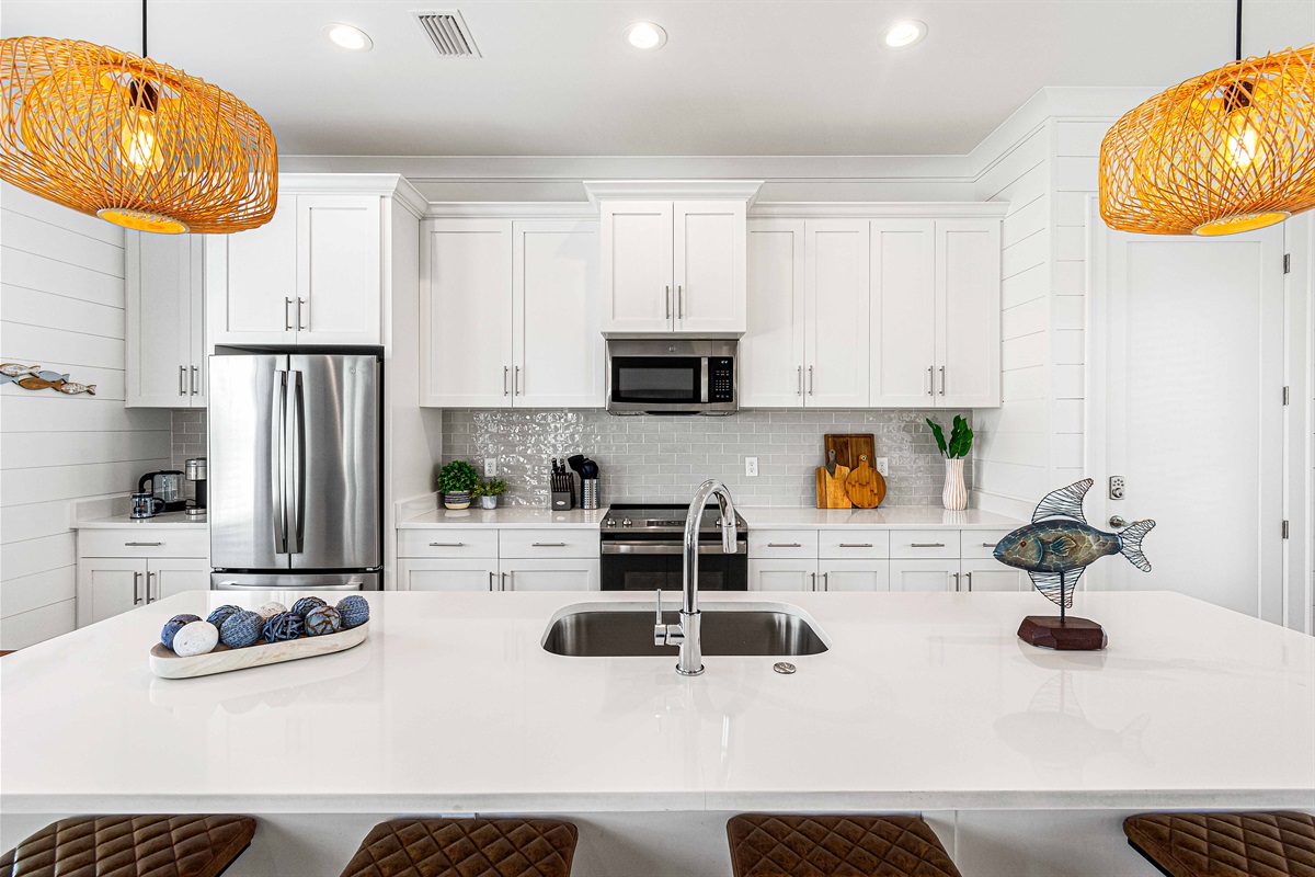 Spacious and Inviting for all the cooks in the kitchen. This kitchen is supplied with everything you will need.