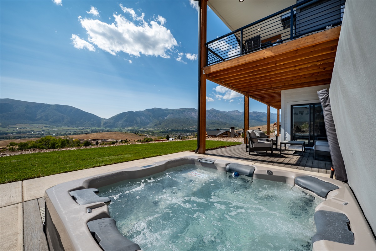 Private hot tub with sweeping views of Ogden Valley — perfect for relaxing after skiing or hiking.