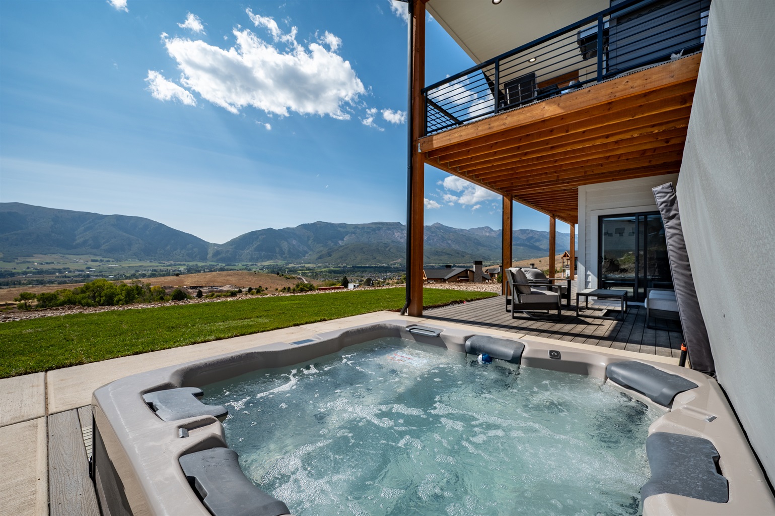 Private hot tub with sweeping views of Ogden Valley — perfect for relaxing after skiing or hiking.