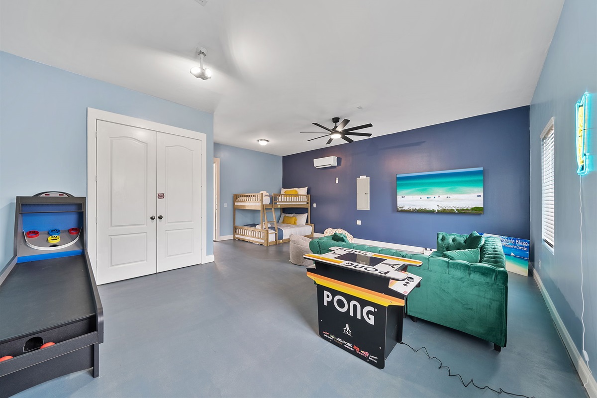 4th bedroom/Game room combo... Sleep, play, repeat__ your fun room with queen bunk beds 