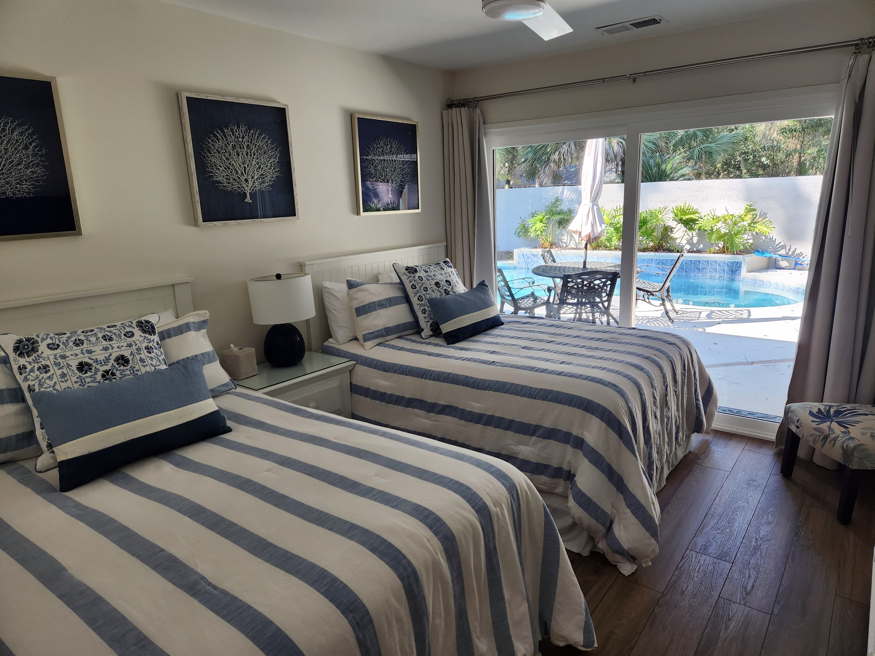 The third bedroom features 2 full beds and spectacular view and access to the pool