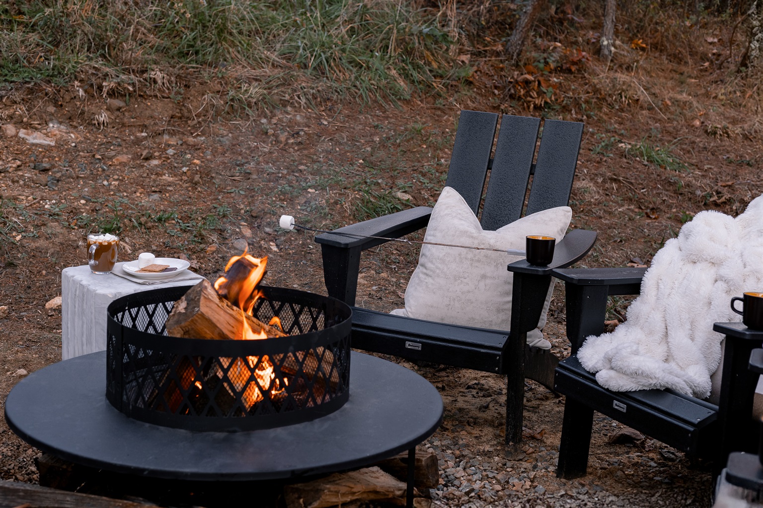 {Smokeless Fire Pit} Cozy up around the smokeless wood fire pit with s’mores roasting and mountain air all around—your golden-hour moment at Gallery House.