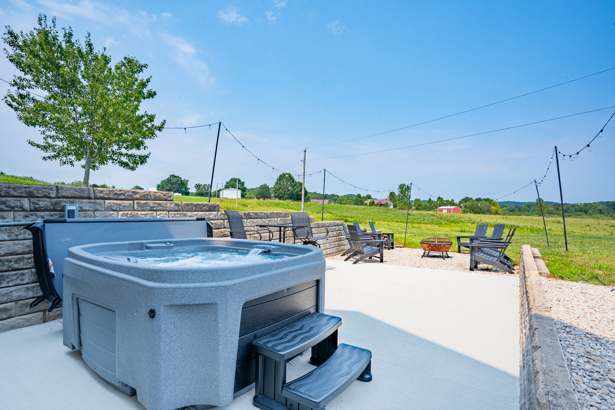 Unwind in the private hot tub or by the fire pit while enjoying the fresh air and sweeping views, a relaxing way to end the day at Sunrise Valley.
