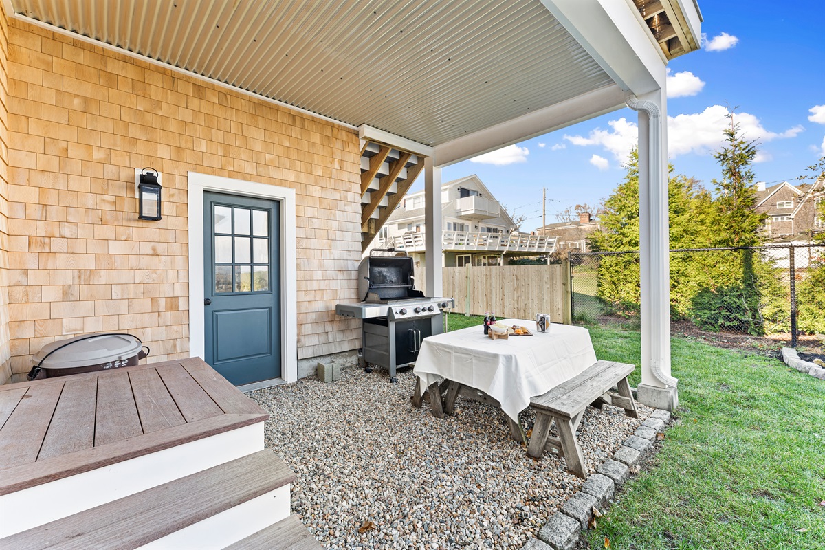 Grill, dine, and relax in this inviting outdoor area.