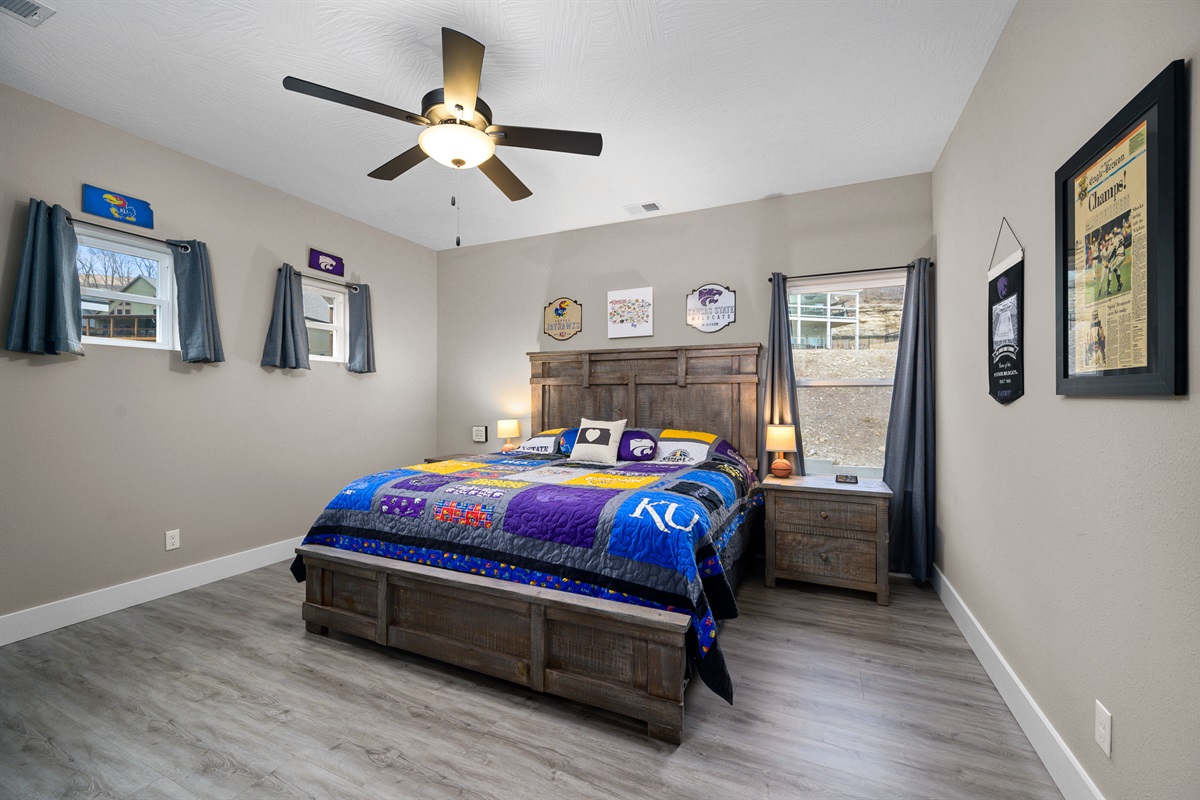 Upper level: Upper level: Kansas room with king bed. Bathroom located in hall.