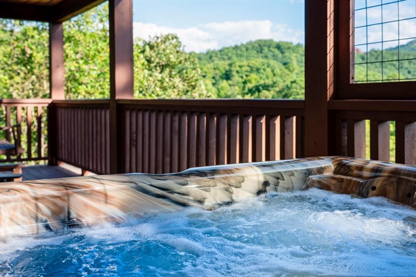 Your front-row seat to the mountains. Unwind in the private rear-deck hot tub and take in the panoramic views.