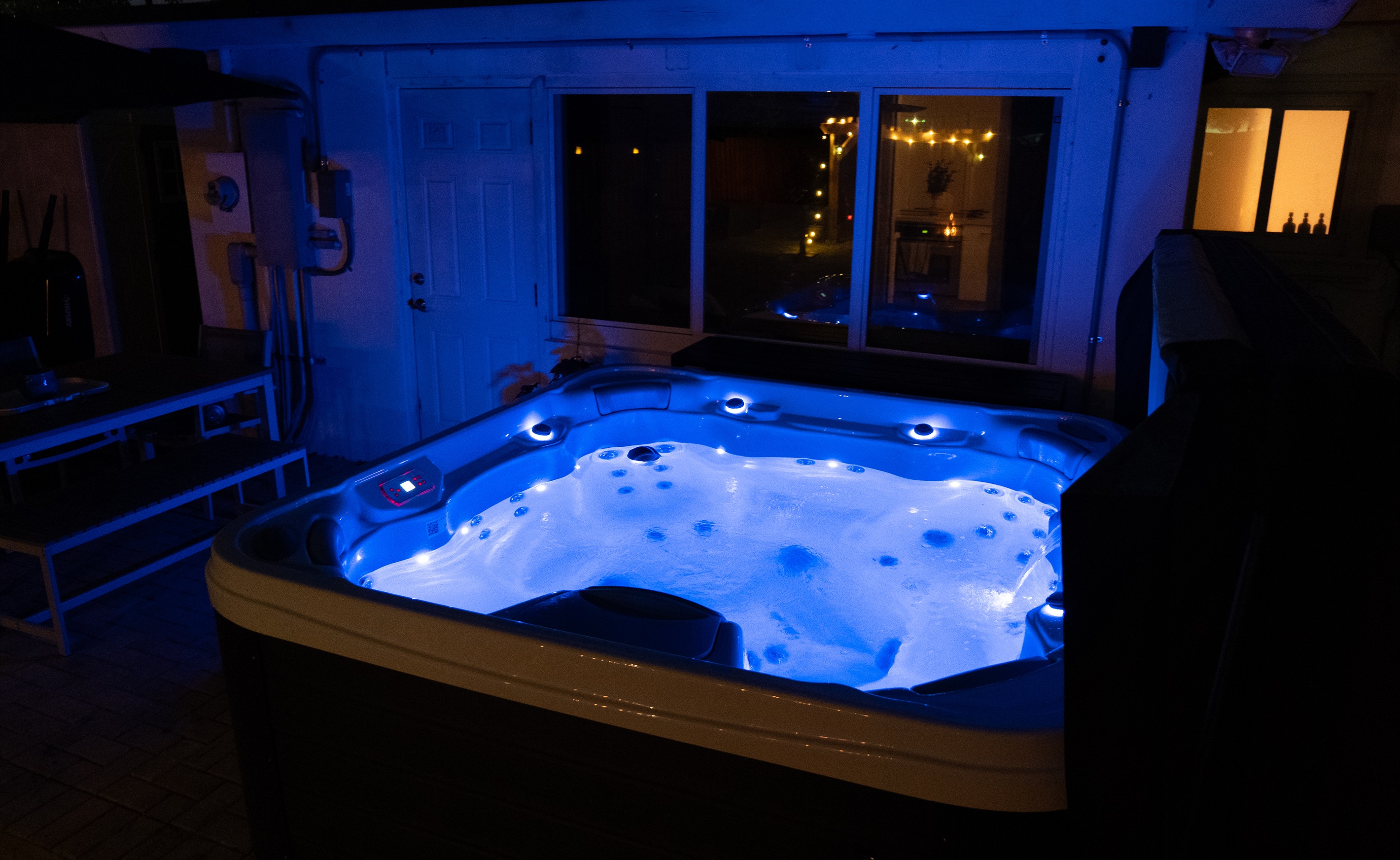 Hot tub lit at night