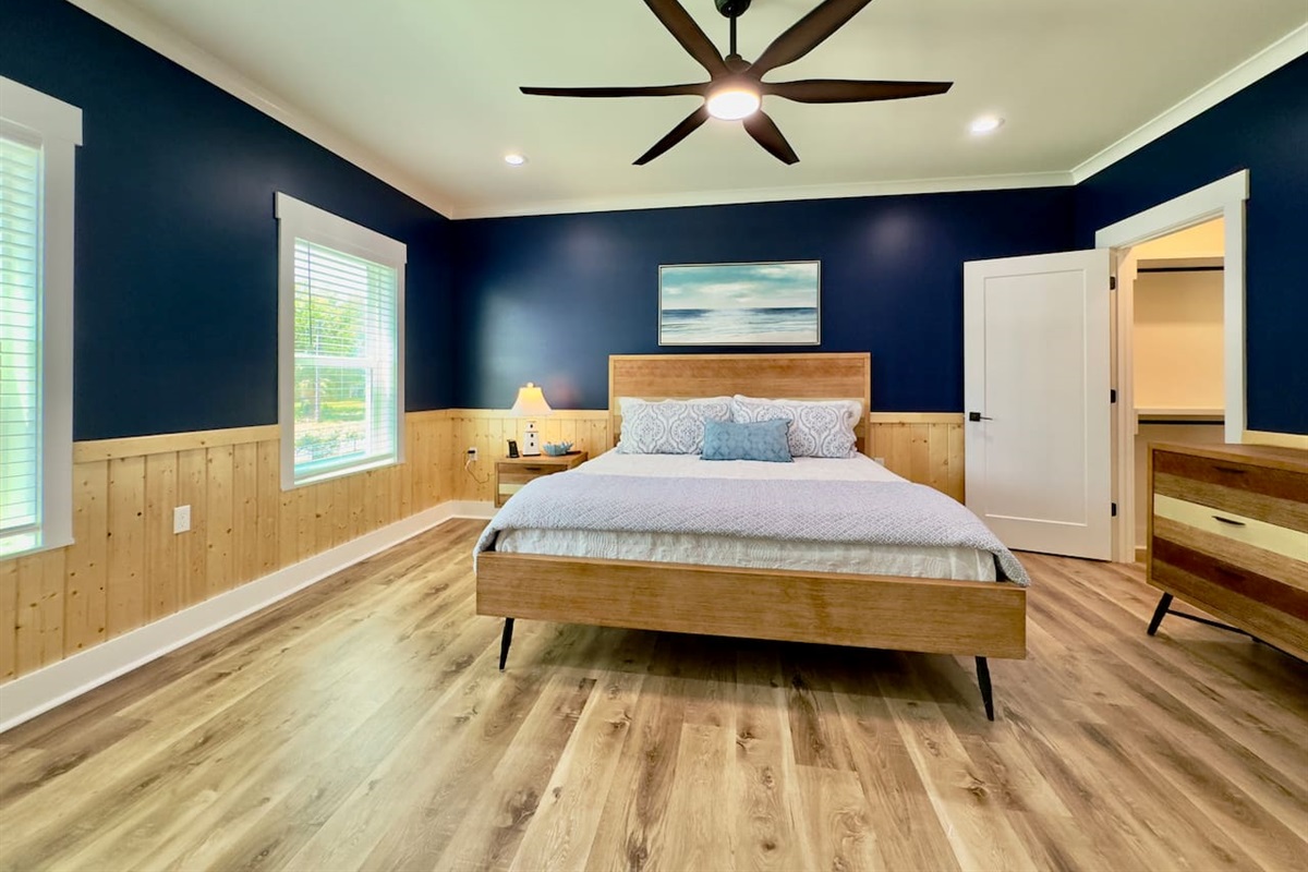 This welcoming bedroom offers comfort, style, and room to unwind.