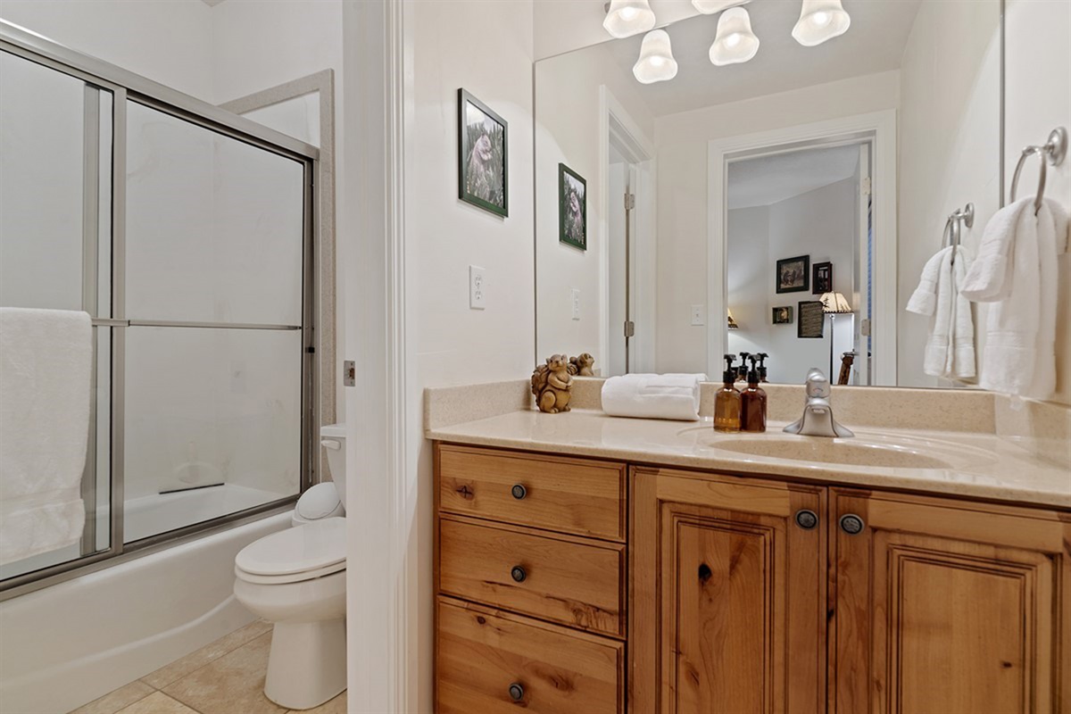Clean, bright bathroom with everything you need for a comfortable stay.