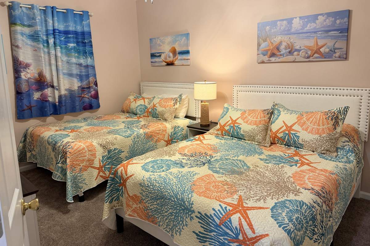 One of two double queen bed rooms