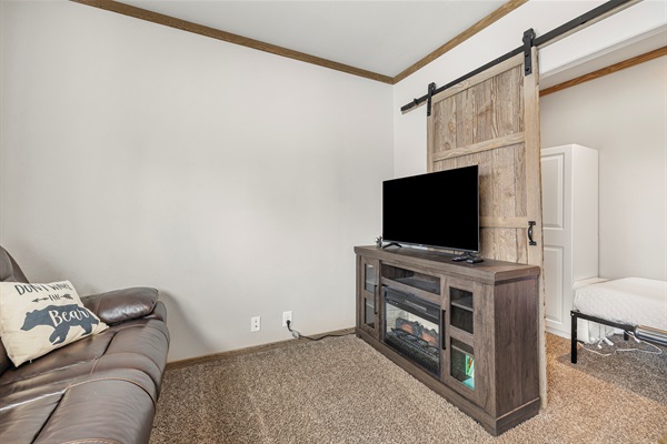 Family Room with TV, Foosball Table and additional twin bed