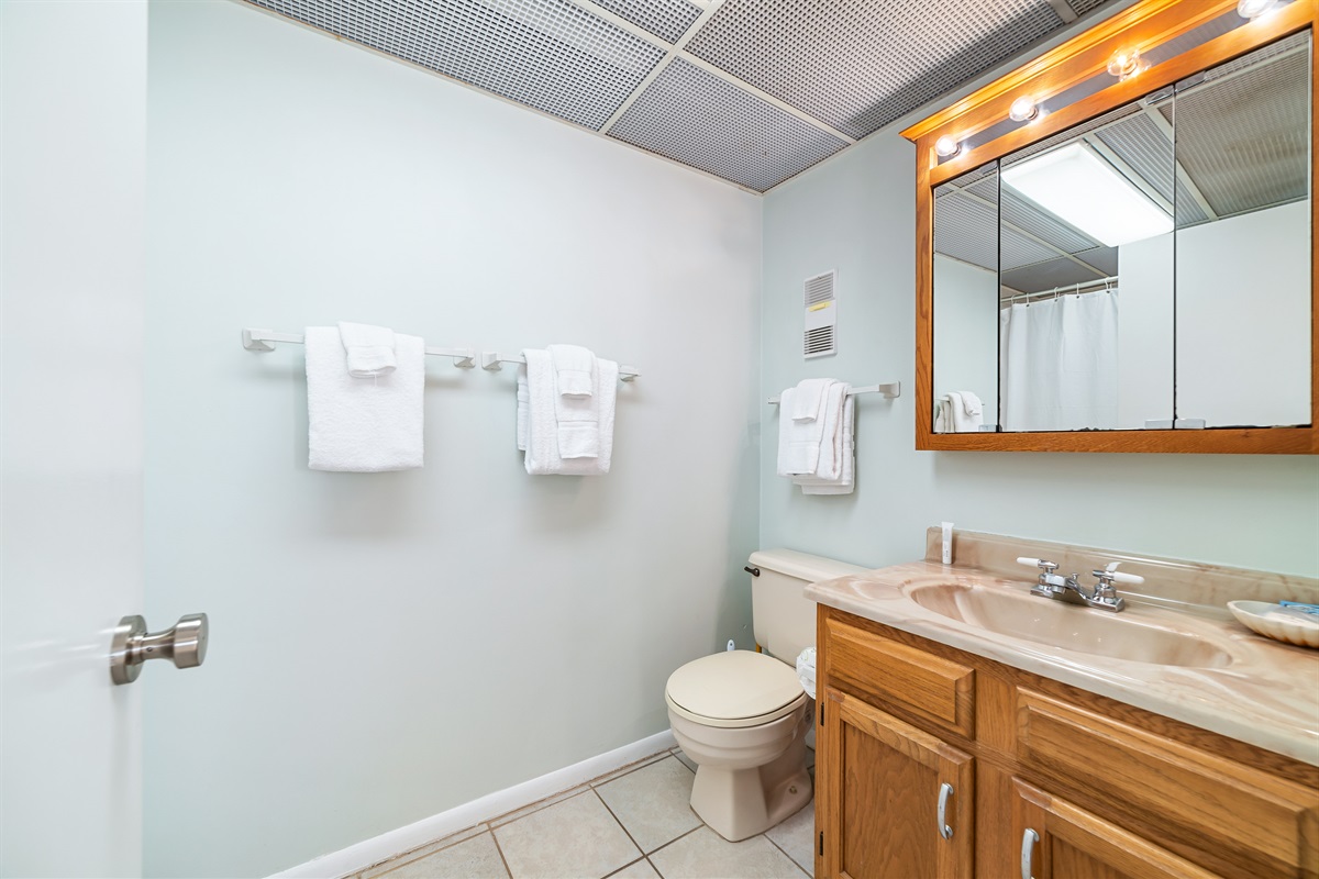 Modern updates meet classic comfort in this bathroom.  Clean lines and thoughtful design provide a relaxing experience.