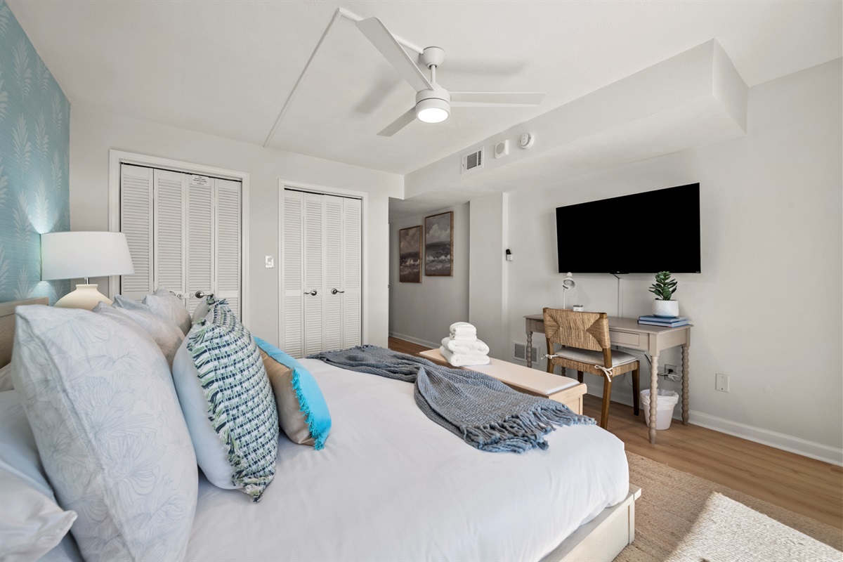 Recharge in comfort with a plush king bed, your favorite shows on a flat-screen TV, and a quiet workspace for when duty calls.