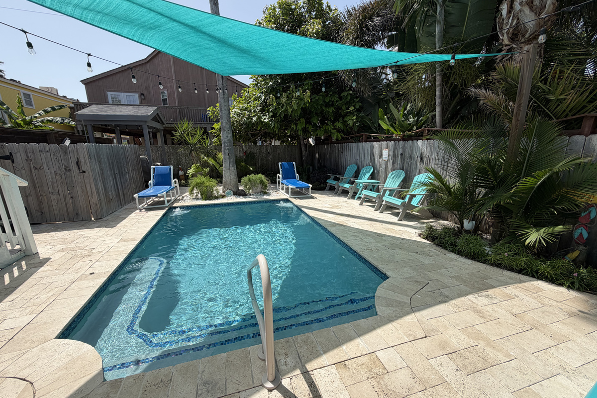 Landscaping compliments this tropical oasis.