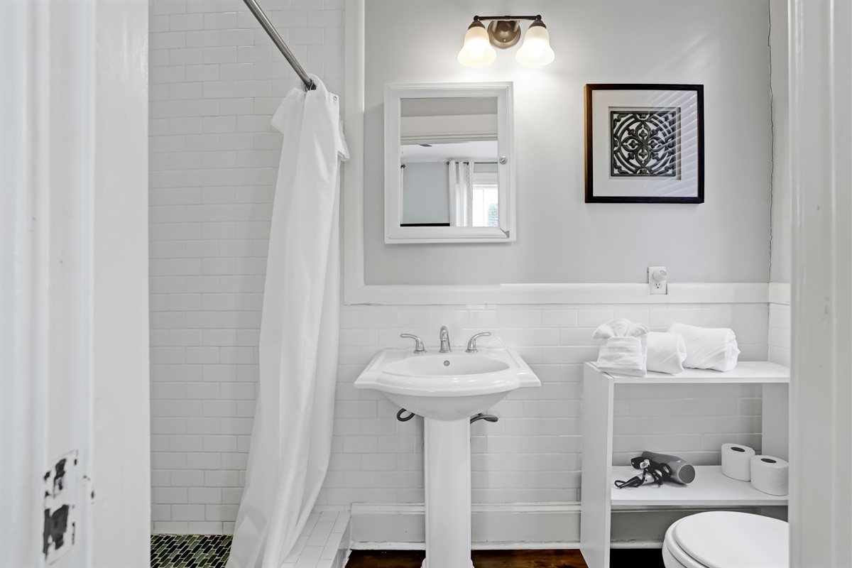A crisp and modern bathroom space for your convenience.
