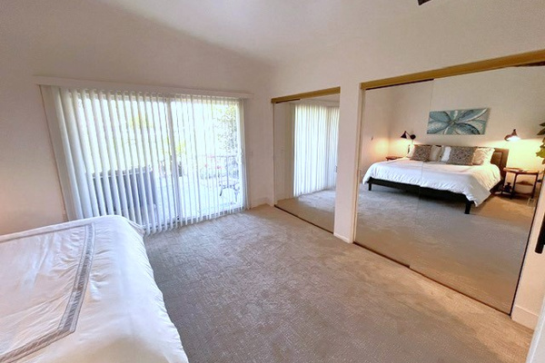 King bed with plush bedding & double closets