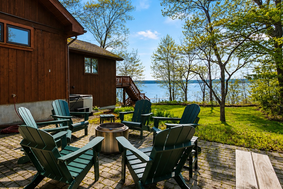 Fire Pit / Hot Tub (alongside the main house) - Gather around the fire pit in our scenic lakeside seating area for unforgettable evenings under the stars. Perfect for cozy gatherings. 