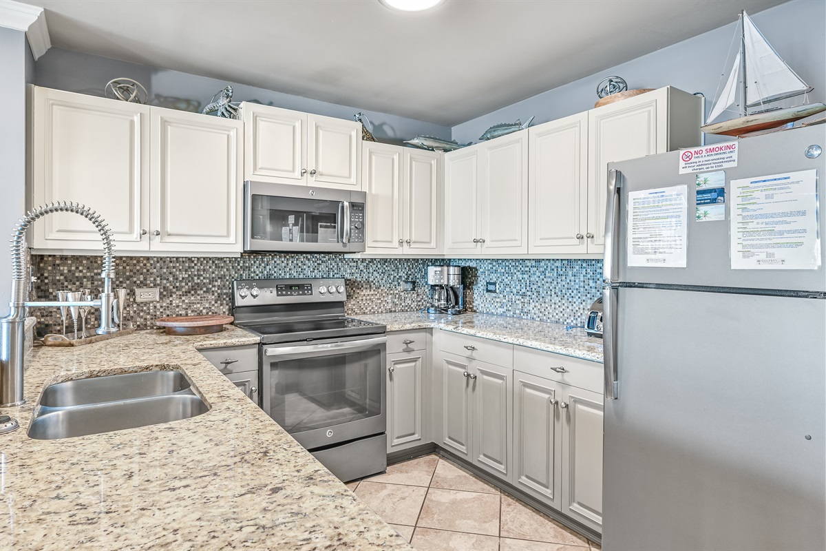 Fully stocked kitchen with new slate appliances...