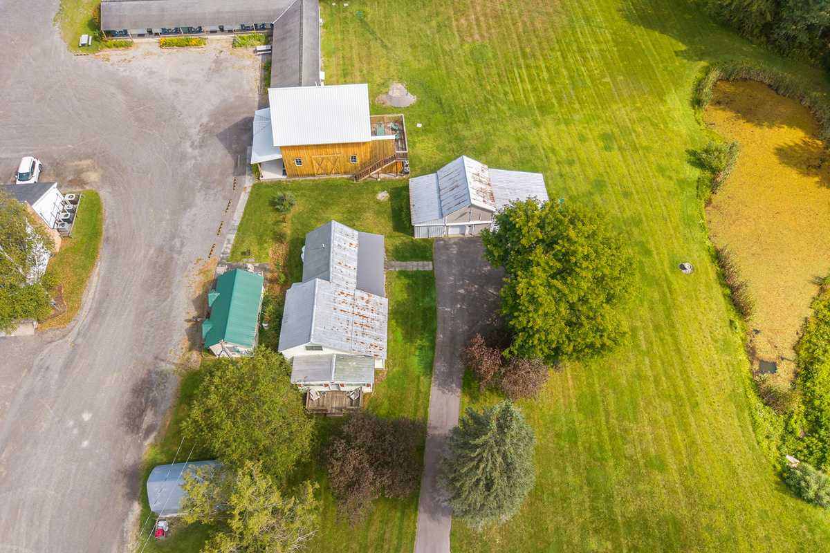 An aerial view of the neighboring 1825 rentals and their shared grounds.