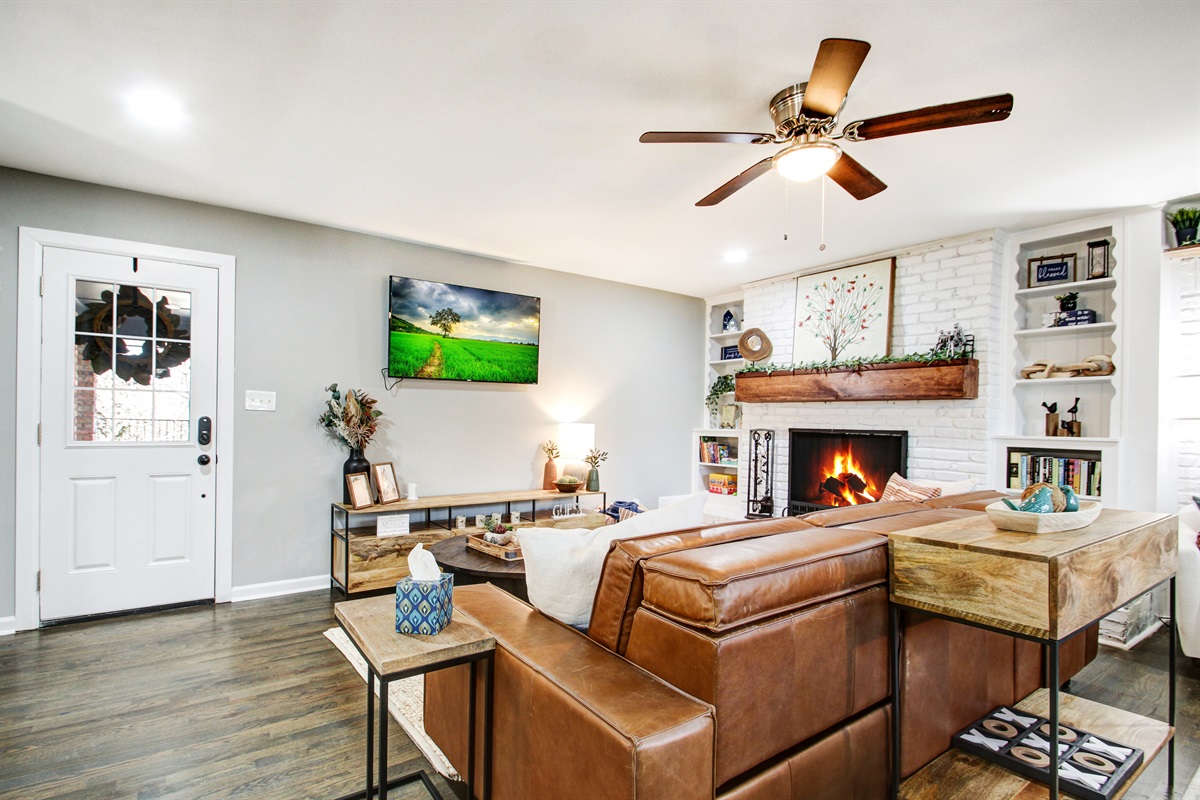 Cozy Couch and Large Smart TV in Living Room One