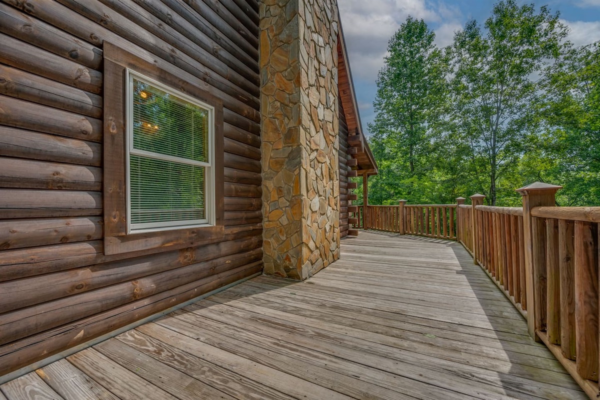 side deck with cornhole games