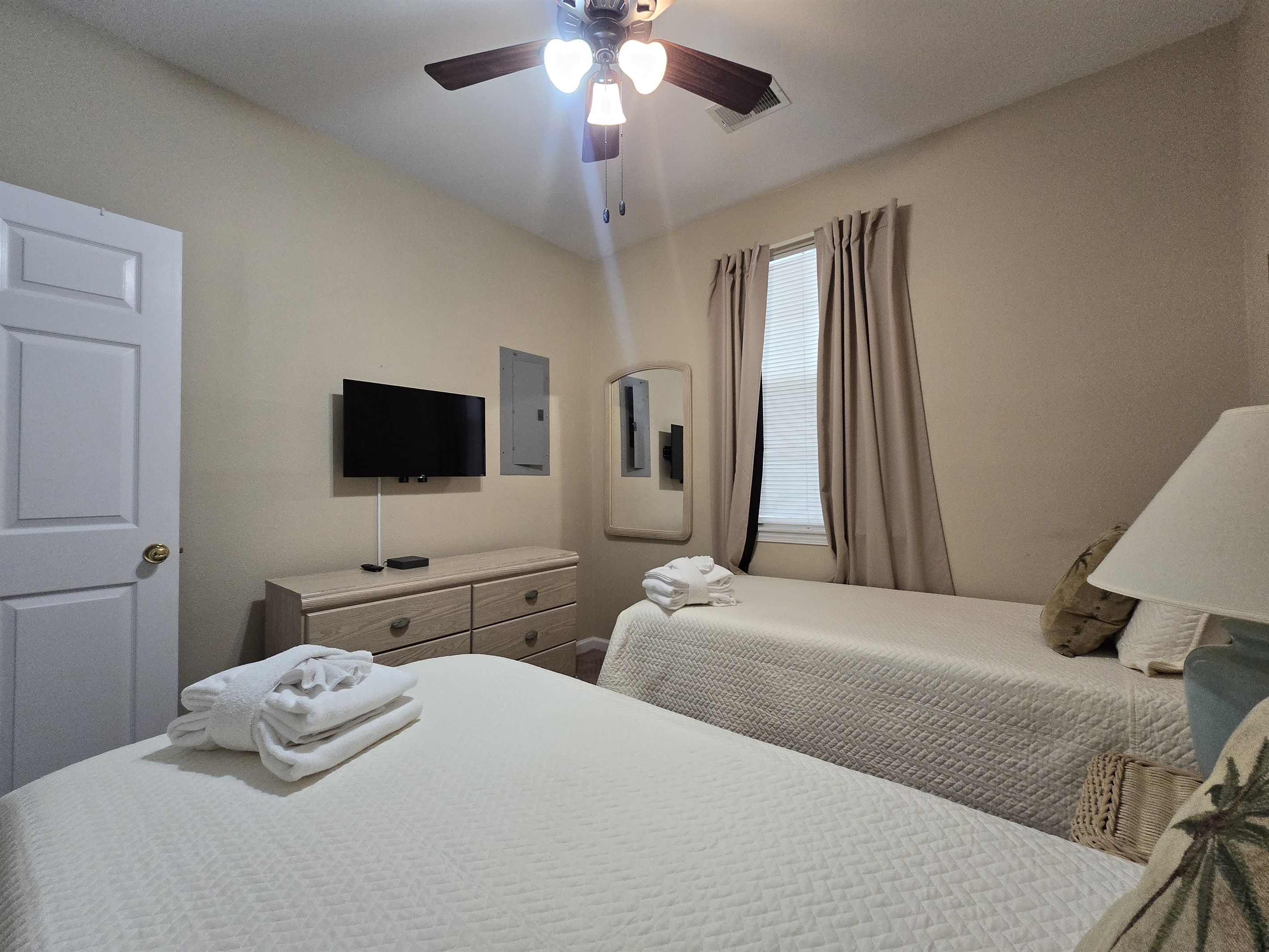 Mounted Flat Screen and Dresser for storage