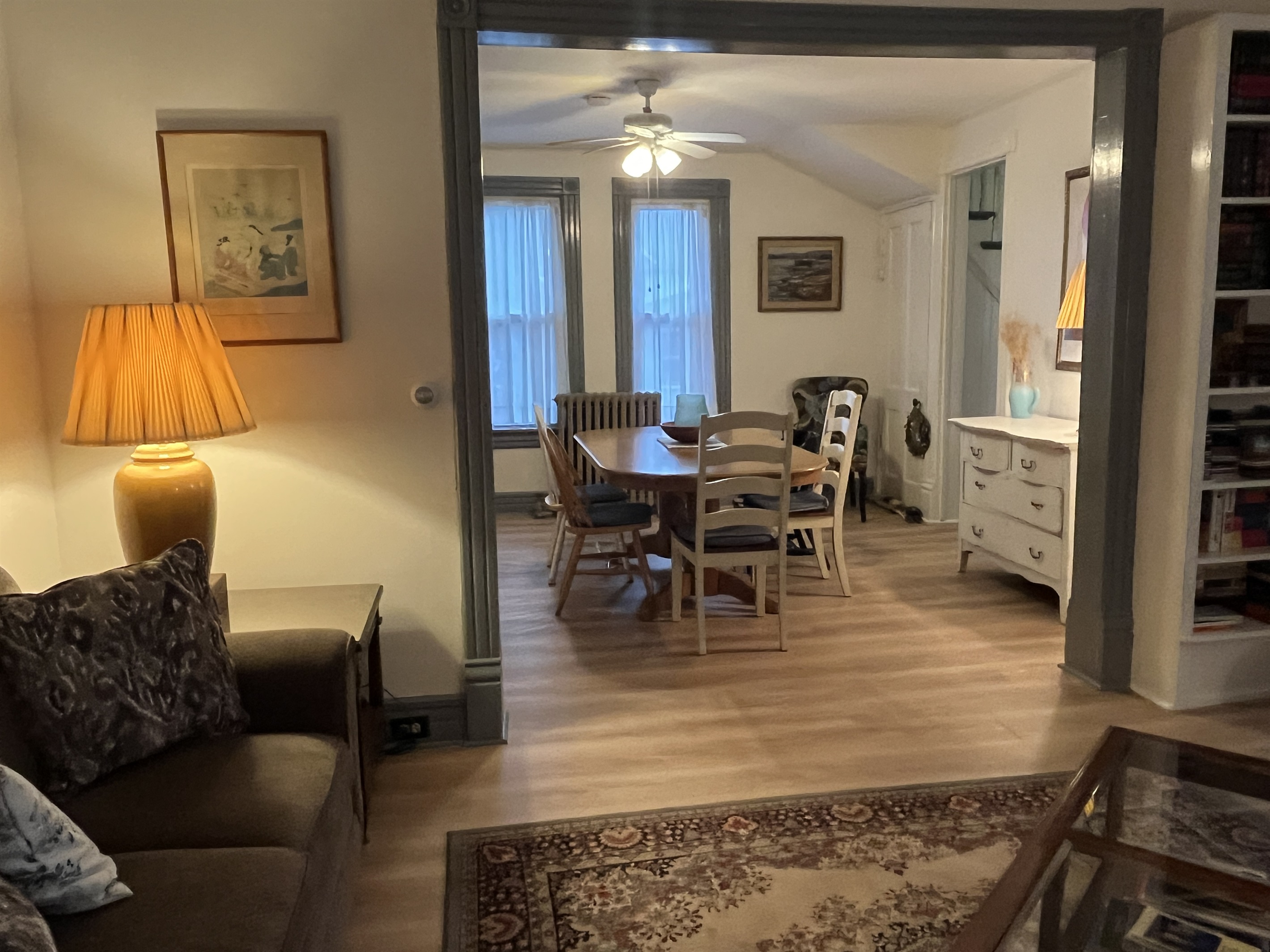 Sitting room with dining room beyond