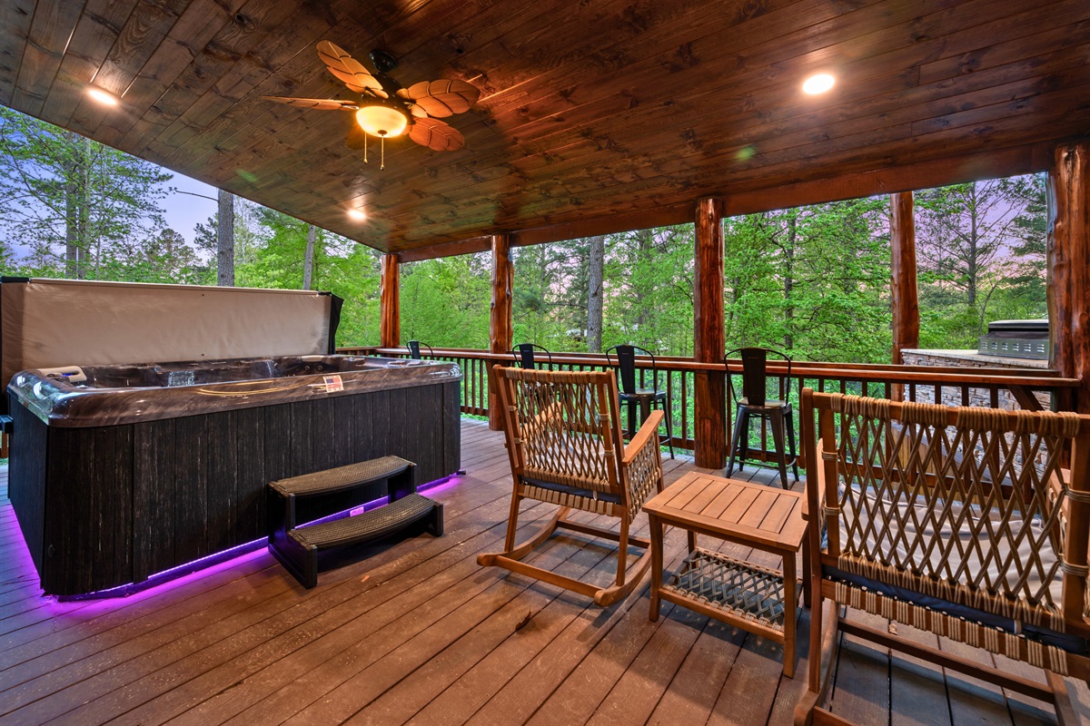 Another seating area on the deck offers a quiet and relaxing spot to enjoy your morning coffee or unwind in the evening.
