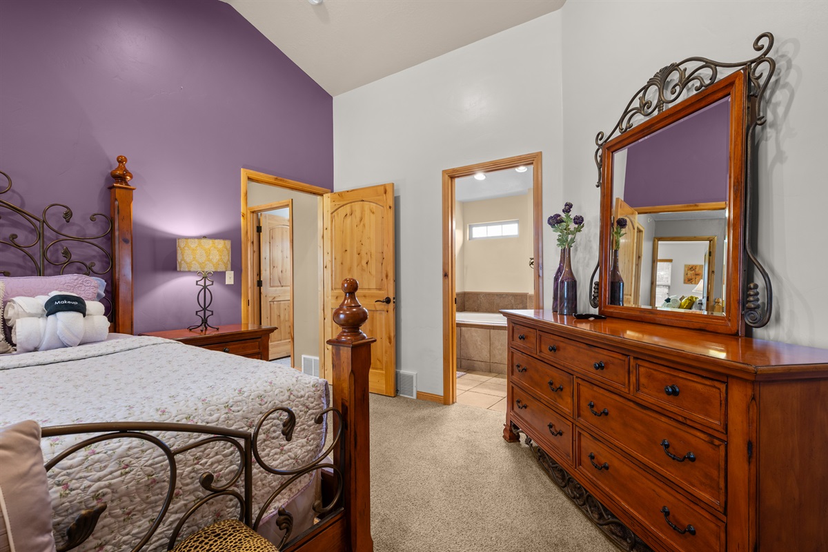 Relax in a spacious bedroom with plenty of room to unwind.