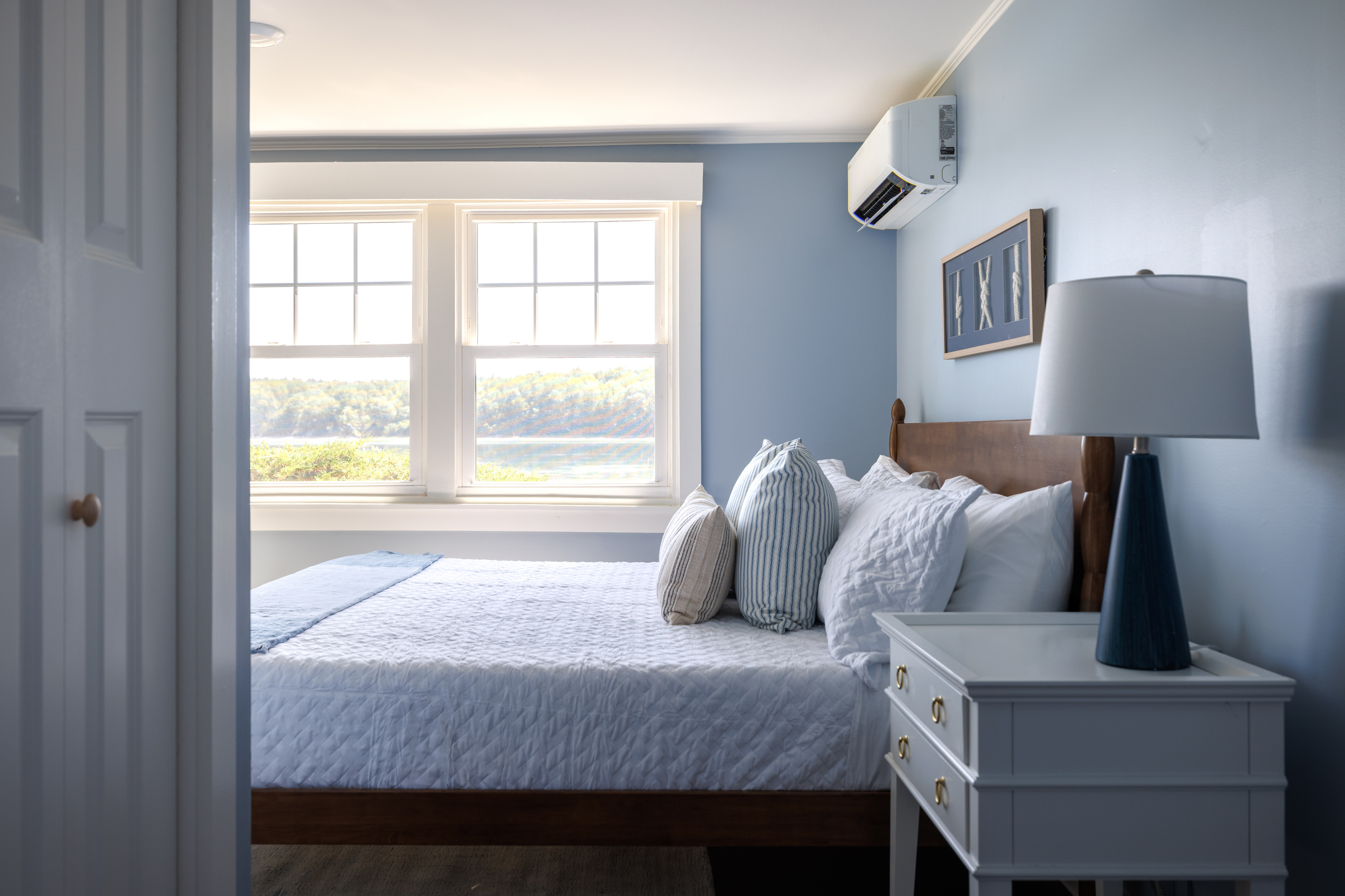 Walk into the master from the hallway and find the whole cove waiting in the windows — the room everyone will want to call dibs on first.