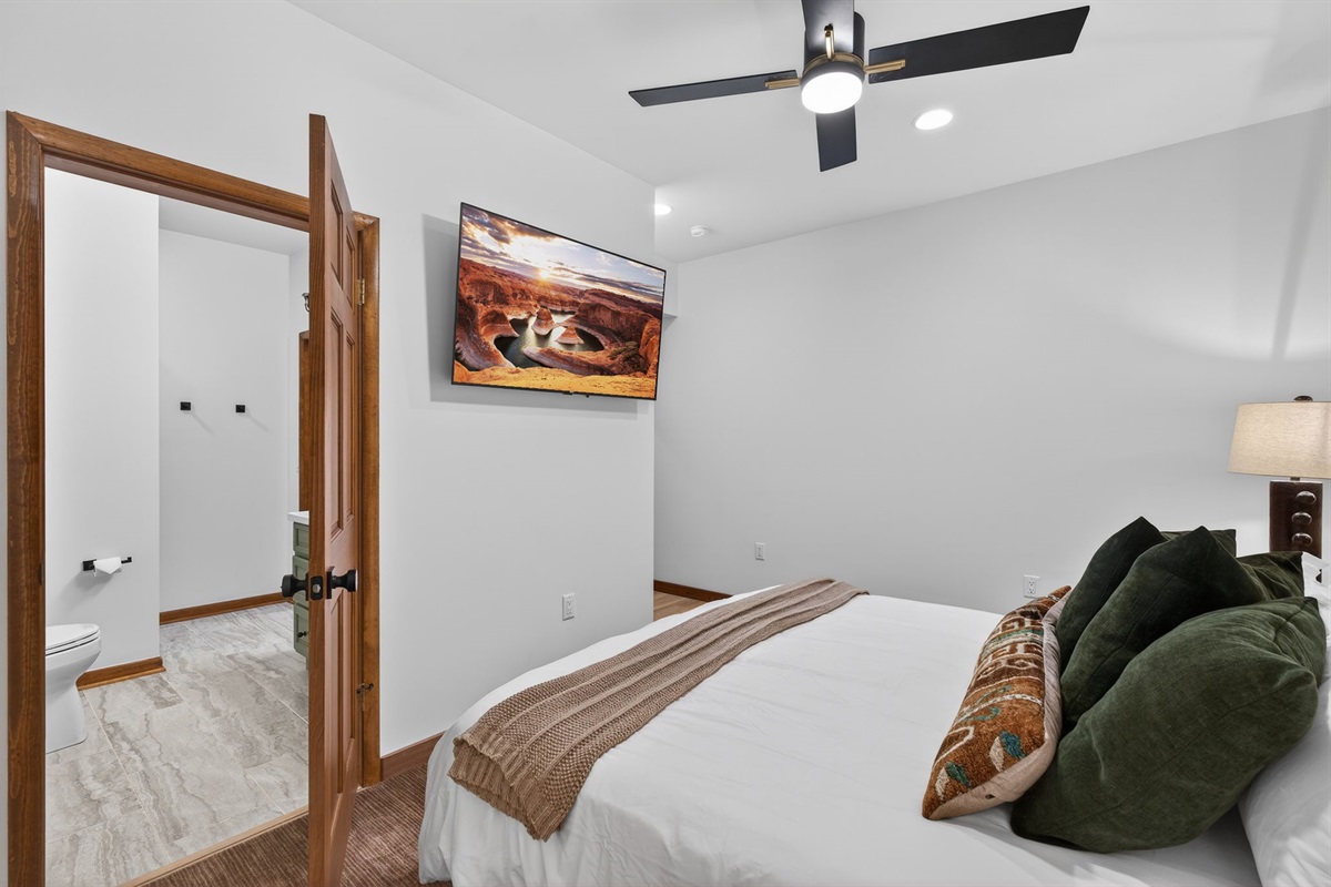 King bedroom 7- Relax in this thoughtfully designed suite featuring cozy textures and elevated décor. (Downstairs)