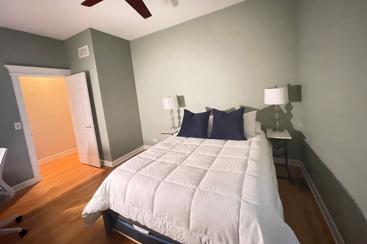 Comfortable bedroom setup designed for quiet sleep, with a trundle bed that slide from under  providing flexible sleeping arrangements for groups