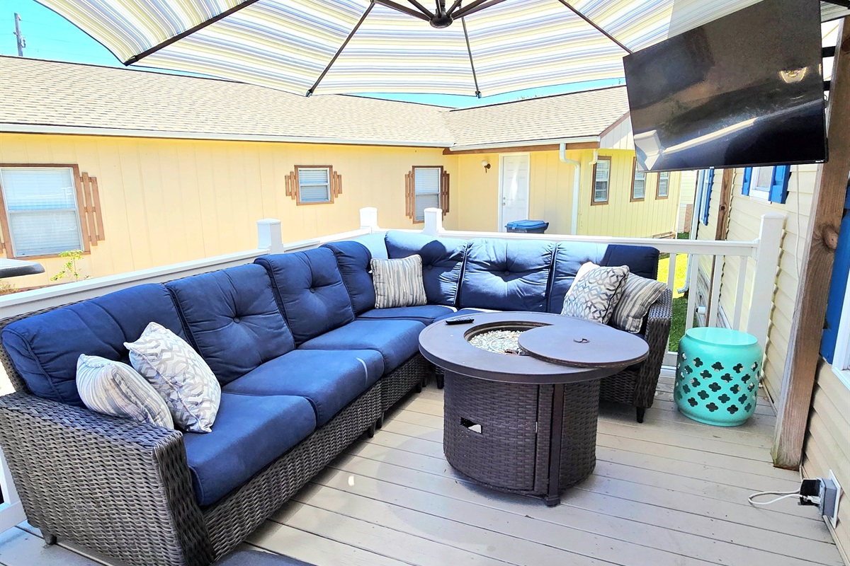 Large umbrella to cover the TV lounge area